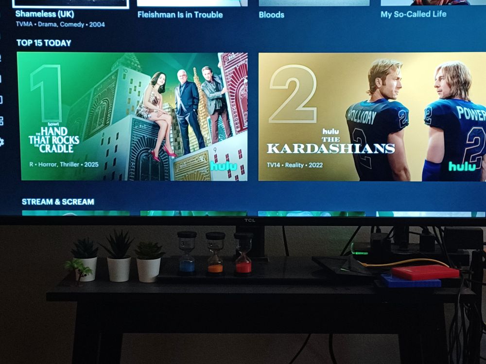 Hulu thumbnails with mismatched titles and images. The Hand That Rocks the Cradle is paired with Only Murders in the Building, while The Kardashians is paired with Chad Powers
