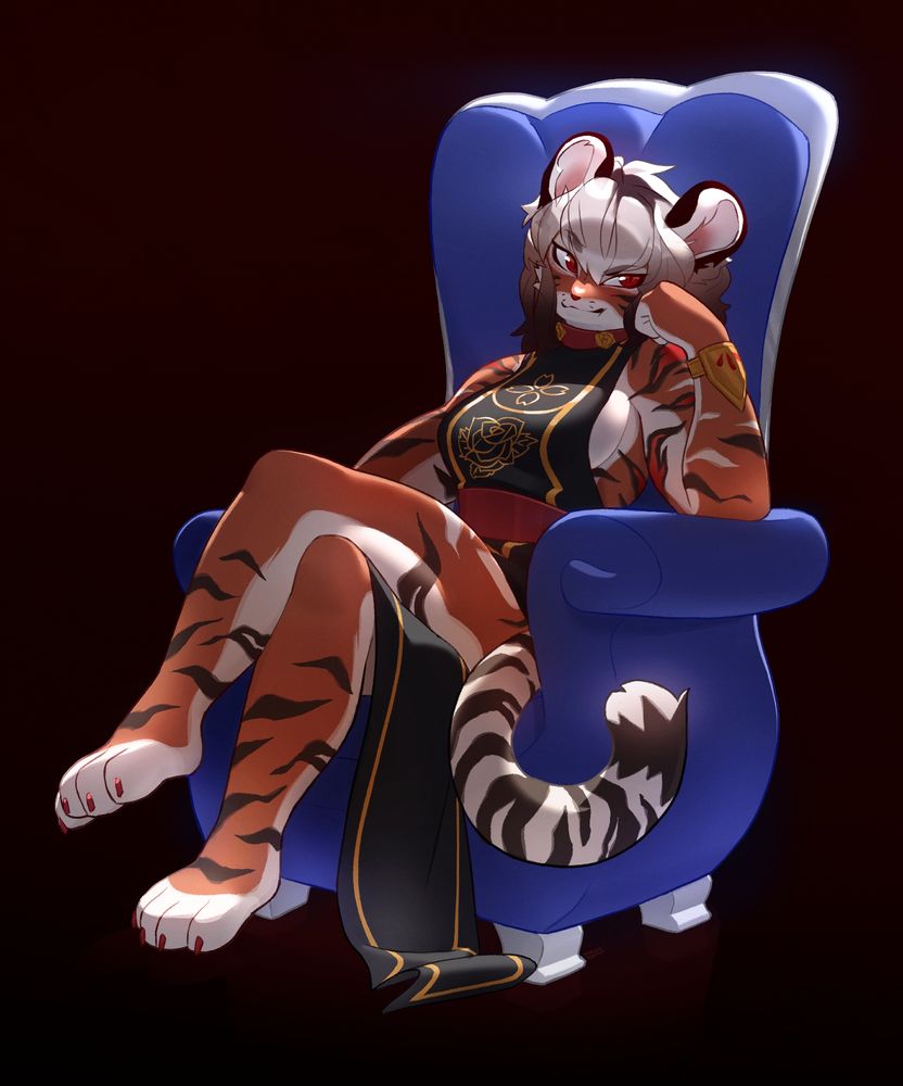 Tiger lady sitting in the blue armchair with a villainous face 😈 