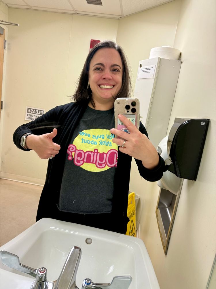 Bathroom selfie wearing my existential Barbie “you guys ever think about dying?” tshirt