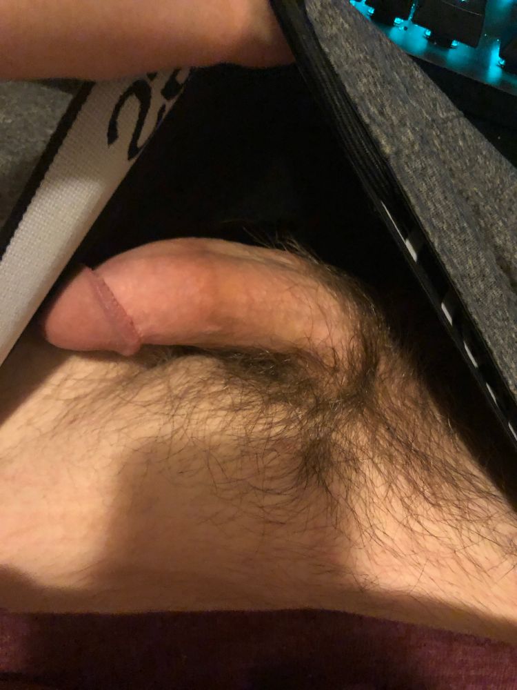 POV pic of my dick as I pull up my sweats and underwear to reveal it. My dick is laying to the left 