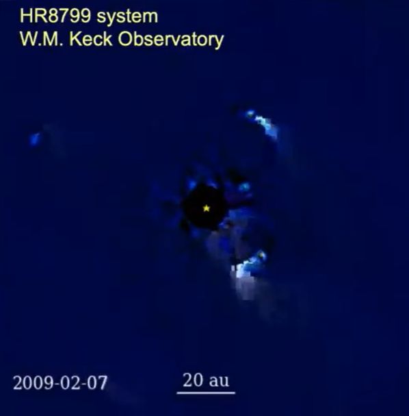 A screenshot of the movie of the 4 planets orbiting HR 8799, but this time they have tails due to some video bug. 