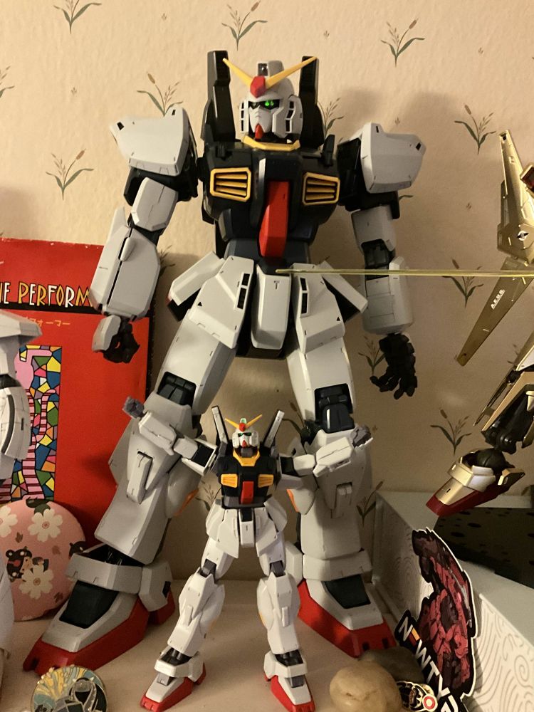 A newly constructed Perfect Grade MK II standing behind a High Grade MK II.