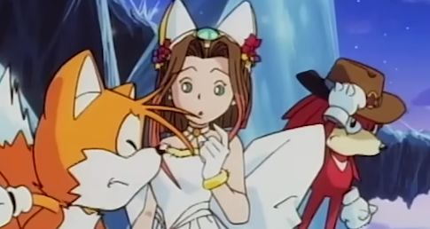 Screenshot from Sonic OVA of Tails, Knuckles in cowboy hat, and the President's Daughter wearing cat ears standing between them.