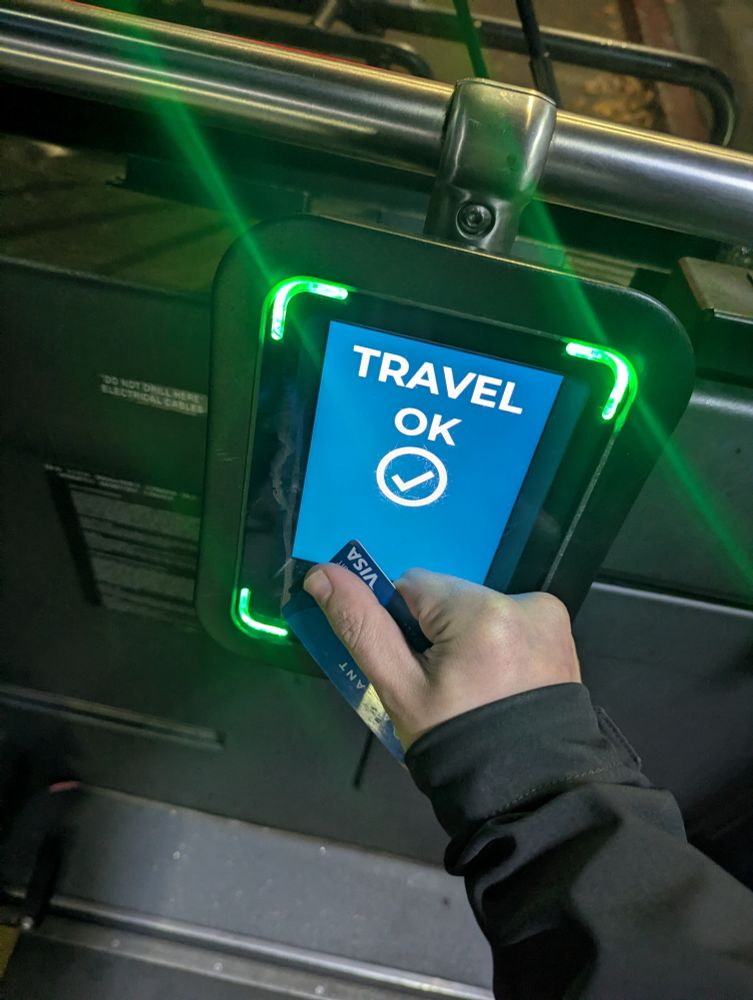 Another photo of a successful green tap onto the bus. As in each of these photos, I am holding my thumb over the card numbers. 