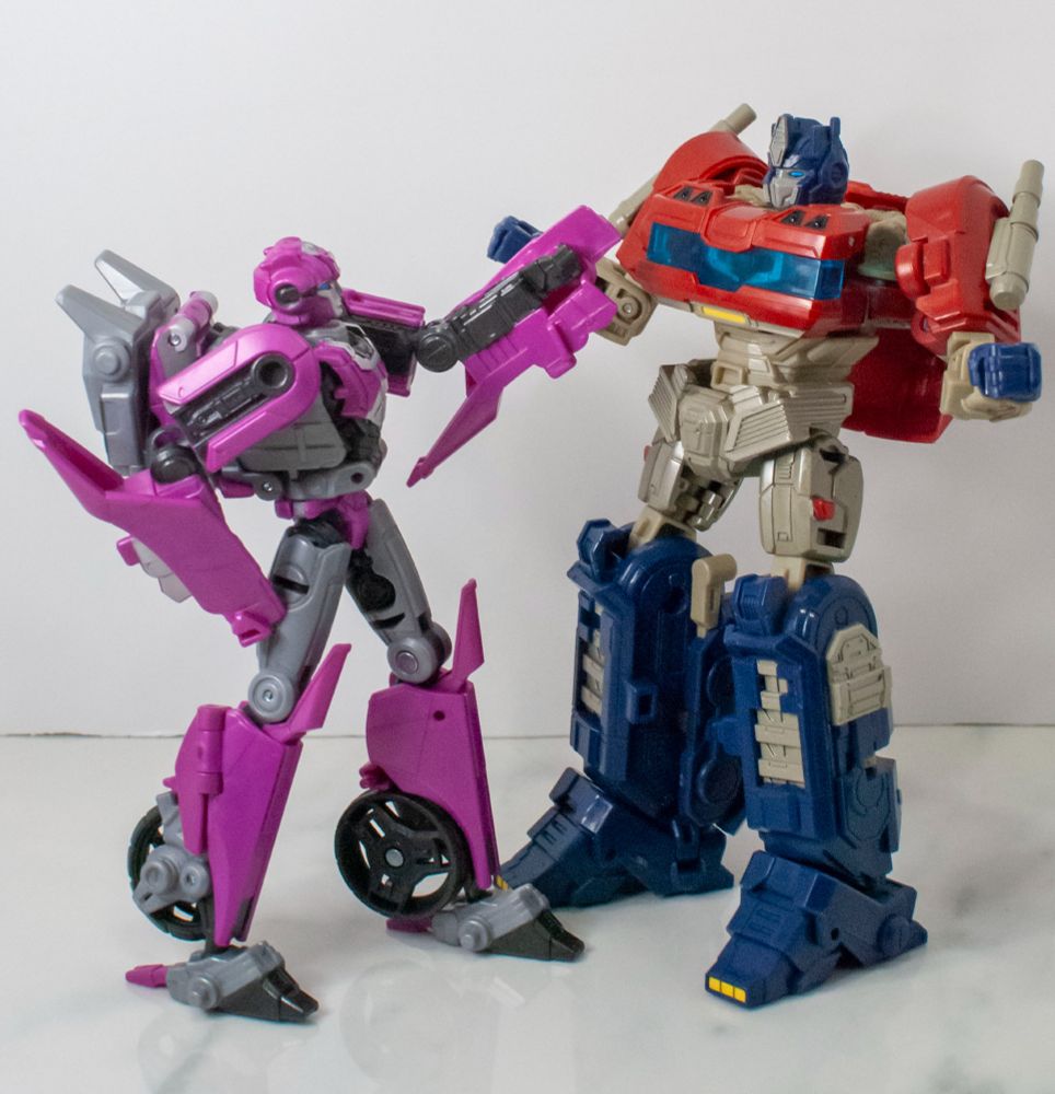 Studio Series TFOne Elita-1, angrily jabbing Studio Series TFOne Optimus in the chest. 
