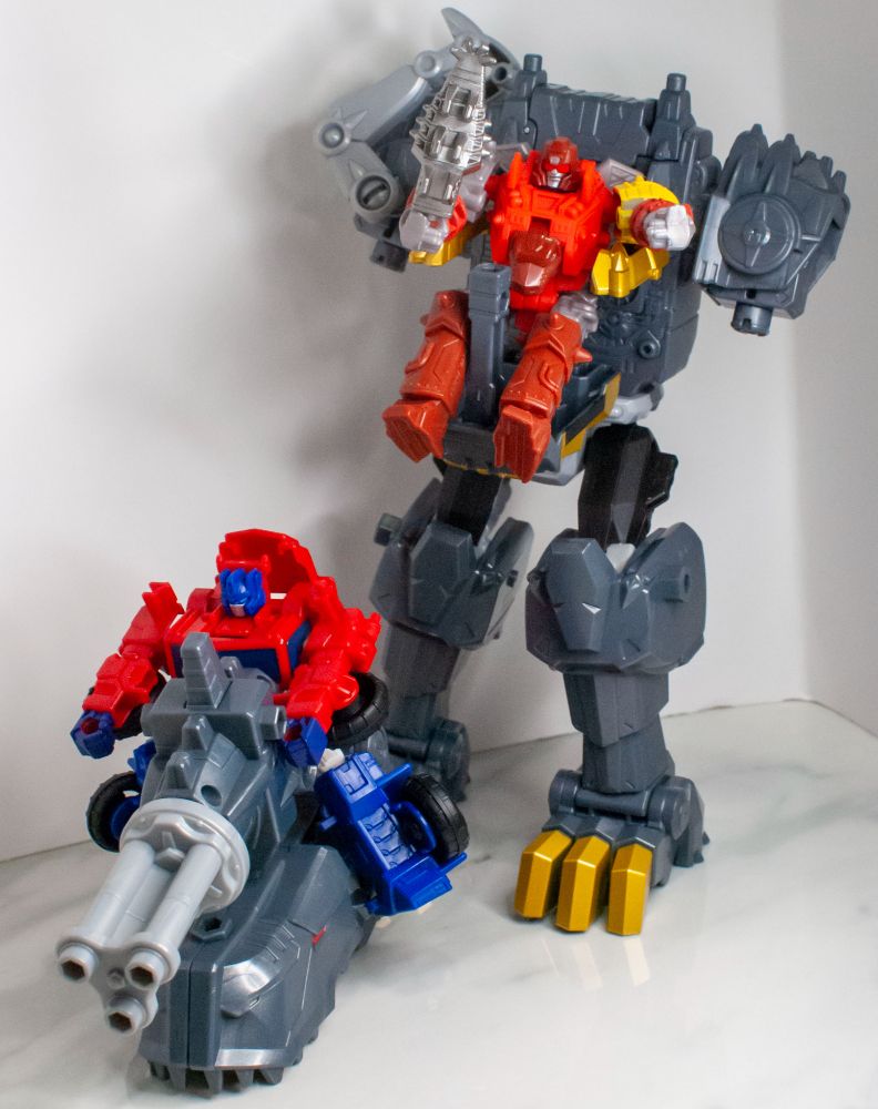 Cyberworld Grimlock split into mech mode and hoverbike mode, with Snarl and Optimus riding each component. 
