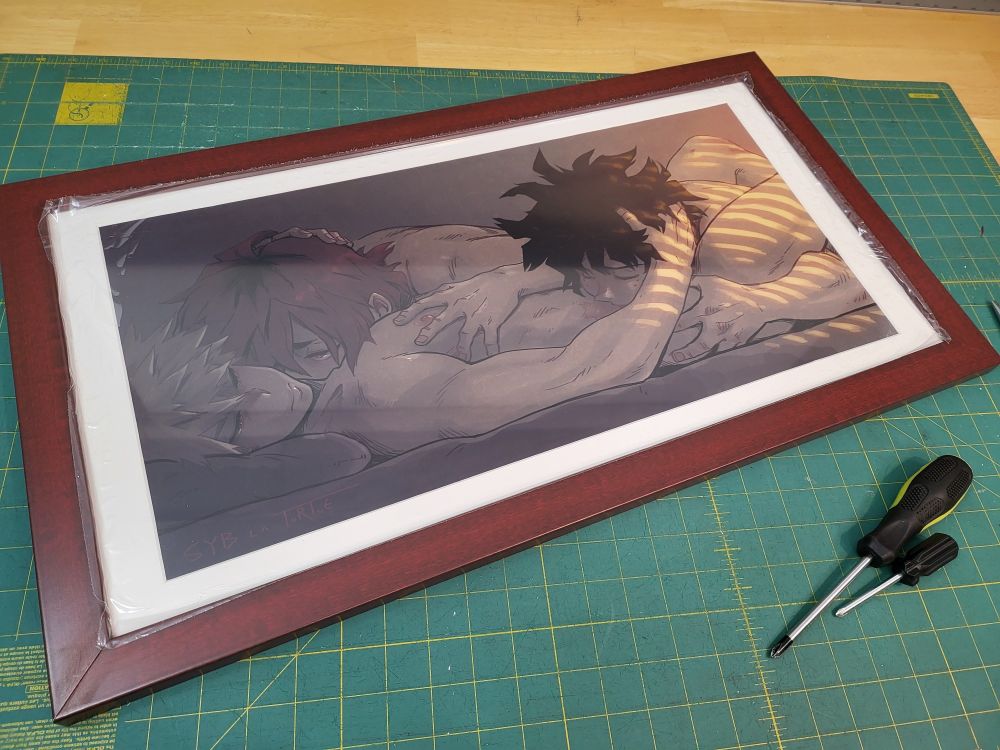 Syb La Tortue's piece "Body Worship," printed at 24x13", framed in a cherry wood frame with a white mat. making the mat to this custom size was a fucking headache but it was worth it 😂😂