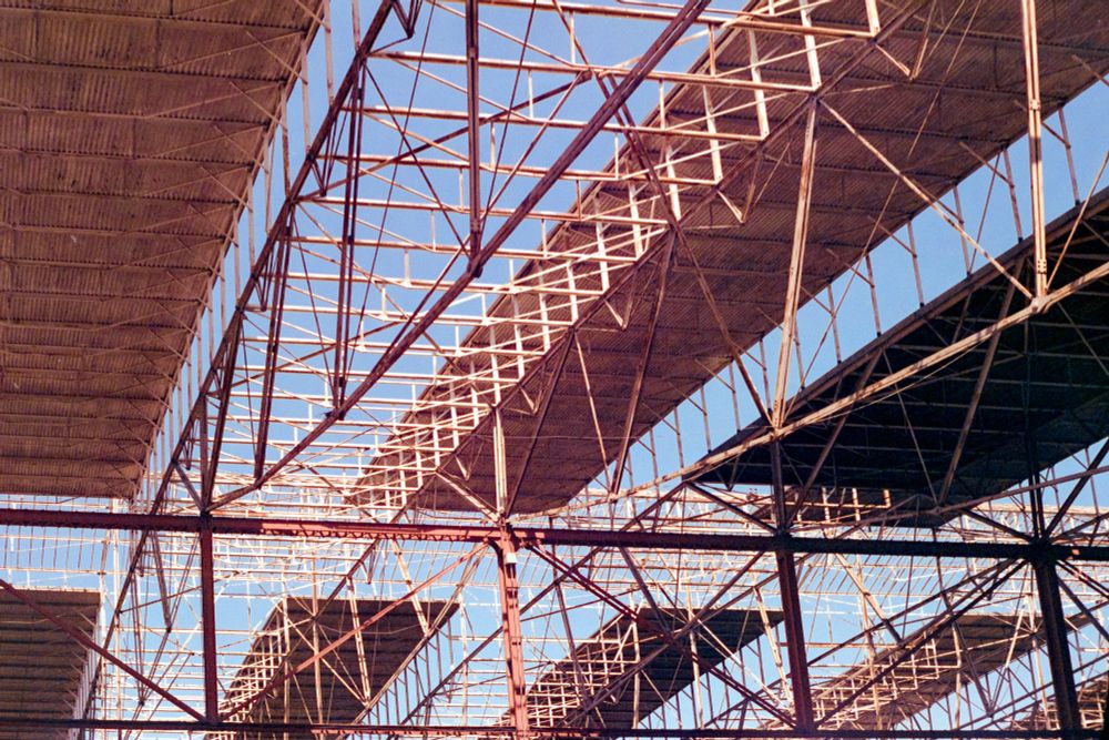 The roof over the outdoor and parking area of Union Station in St Louis. 
Shot on expired Fujifilm F-64D rated at 32 ISO with a Yashica Lynx-14.