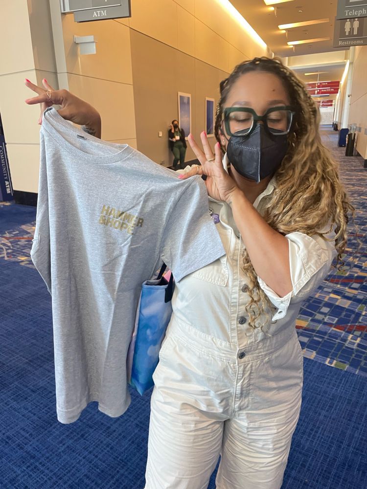 Eve Ewing with hammer and hope shirt 