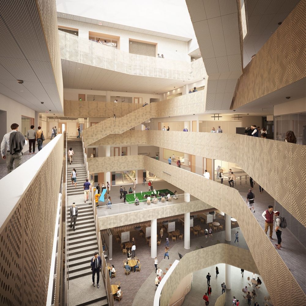 A computer render of the interior of the new computer science, information science, and statistics building. A staircase crosses an open atrium with visibility across multiple floors 