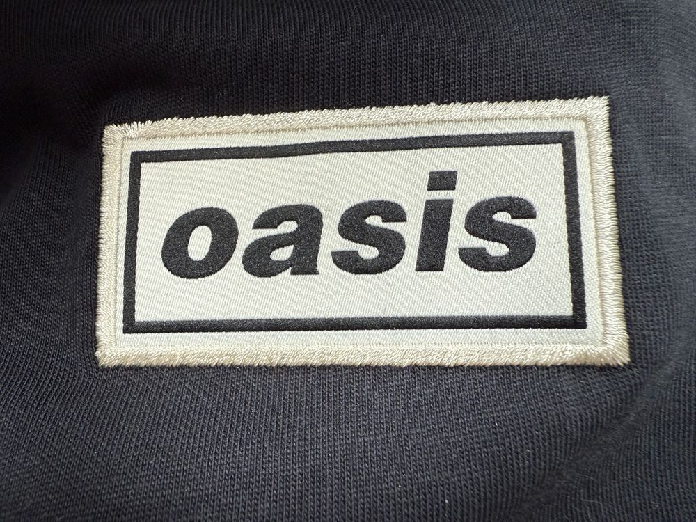 Oasis logo on black T-shirt 