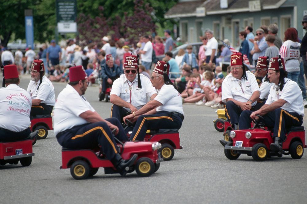A picture of various Shriners driving about in their tiny cars.  For what it's worth if I was attracted to men I think I would like this because it's funny, and also because Shriners are mostly known for their charity work and children's hospitals.