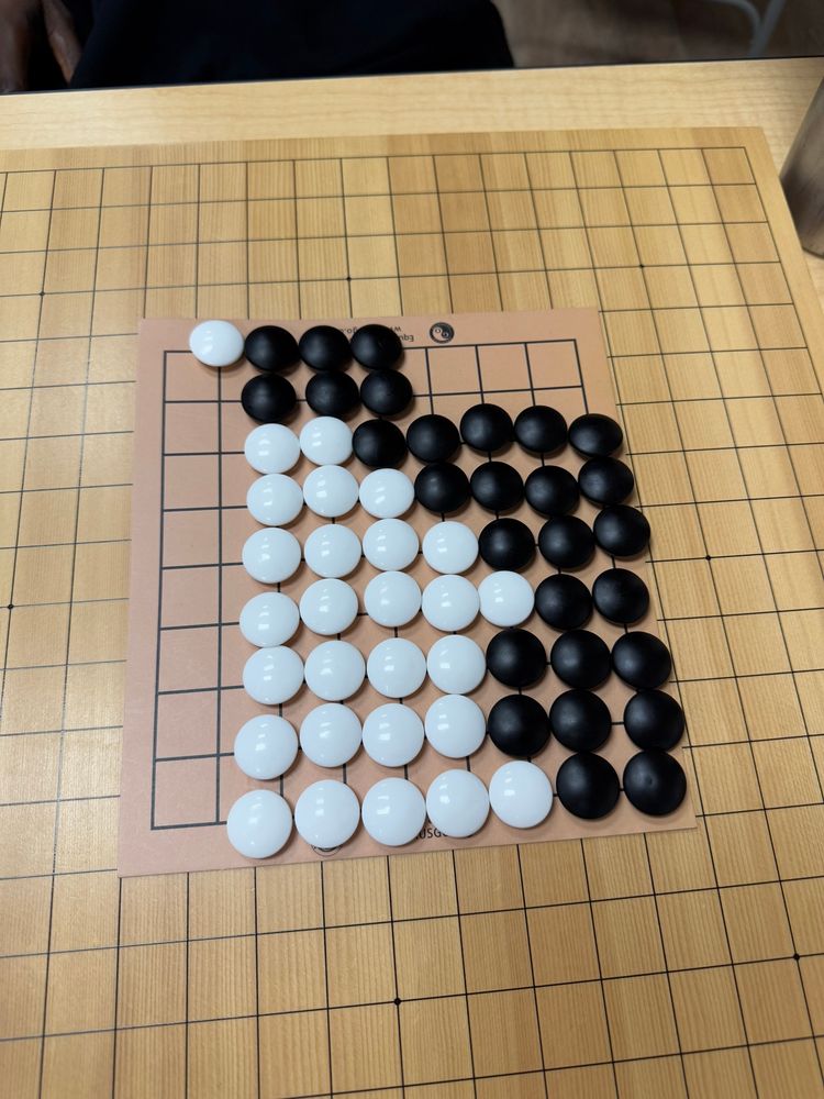 A finished game of Go on a 9x9 board. I played against a beginner at about the same level as me. His name was Dee, we both started around October of this year. I played as white and won! He defeated me in our 2nd game, however.