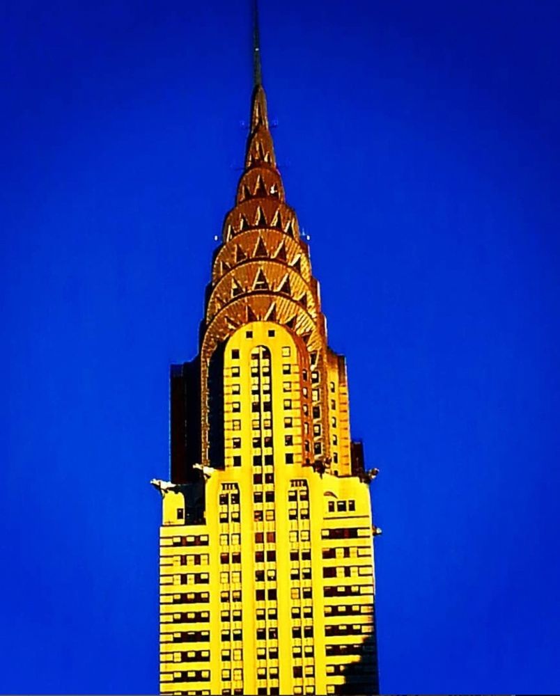 Blue sky and Chrysler building in yellow