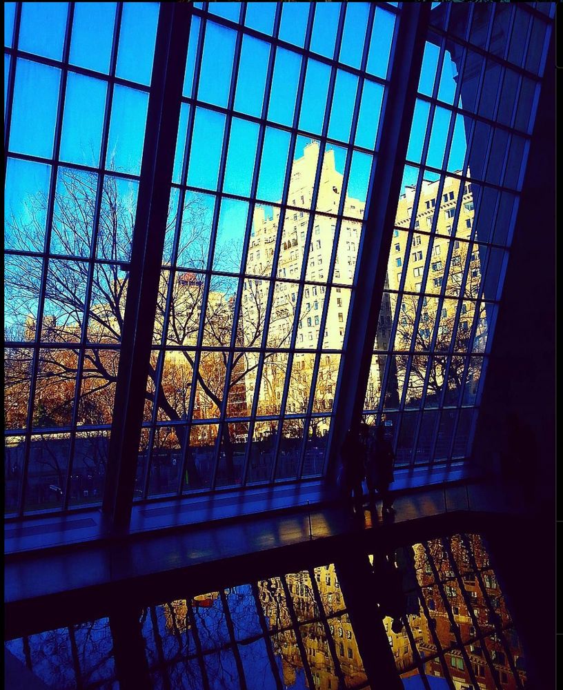 Reflecting pool and windows inside the Temple of Dendur in the Met Museum in New York City.