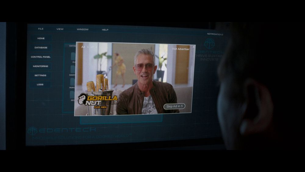 Liam Neeson forced to watch an ad for an energy drink called Gorilla Nut.