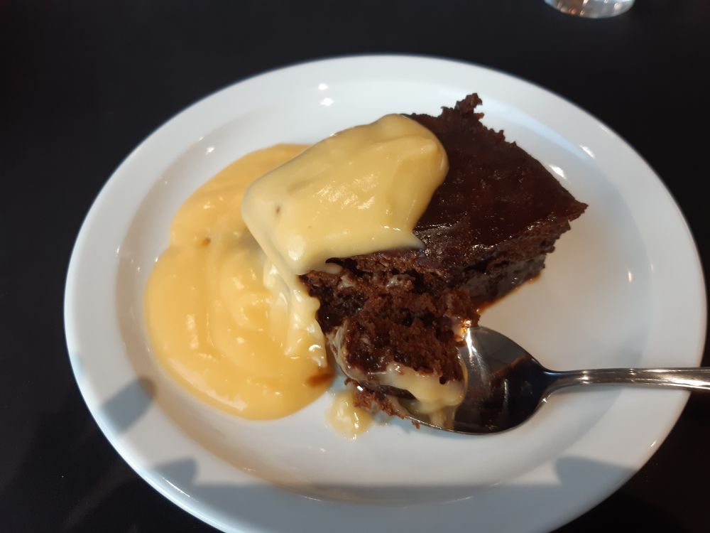 Big slab of parkin with custard