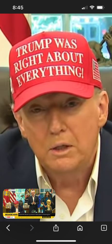 Donal Trump—in his usual red trucker hat—looking very, very tired at the Fifa trophy groping in the Oval Office.