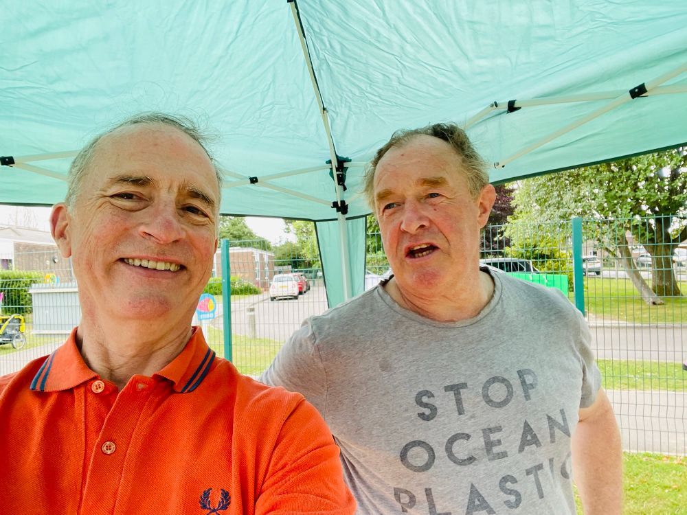 Fishbourne Village Fête today: Harbour Villages Ward District Councillors having fun selling programmes. More than 750 local residents turned out to support.