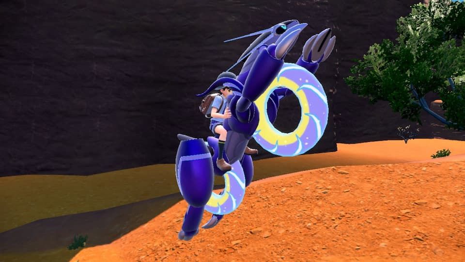 A pokemon trainer on the pokemon motorcycle, with purple glowing chevrons on the tires being the distinctive feature