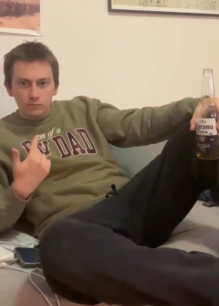 A guy pointing to himself in confusion 
