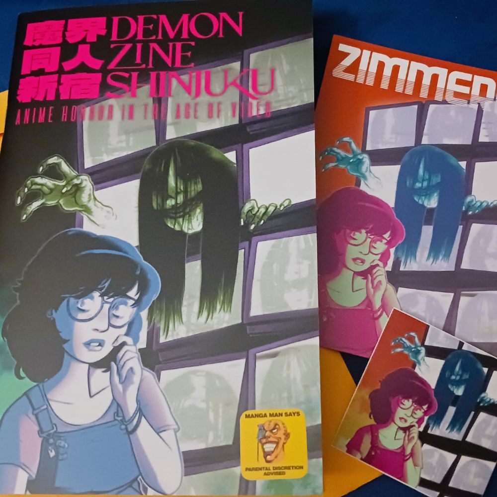 Zimmerit's "Demon Zine Shinjuku" zine on retro horror anime. Next to it are a matching postcard & sticker with the same cover art in a different colorway. The cover art by Jandri shows a girl in overalls with short hair & glasses, standing in front of a wall of TVs. She doesn't seem to notice a horrific looking creature with claws & long, dark hair emerging from the TV screens behind her.