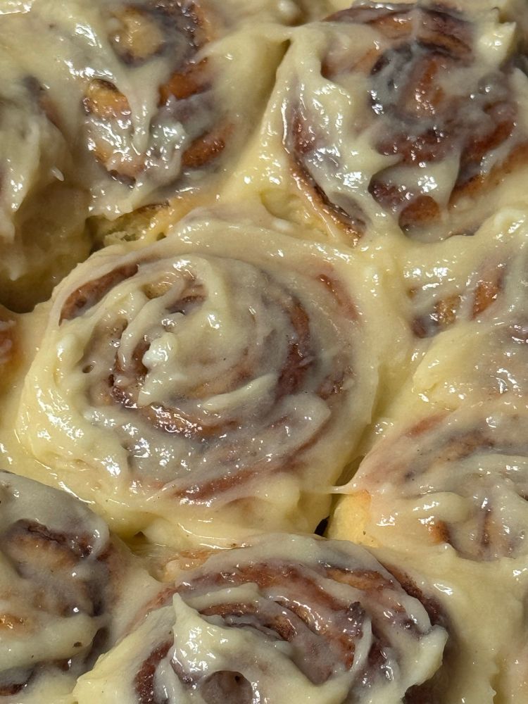 My ooey gooey Christmas cinnamon rolls up close and center. 