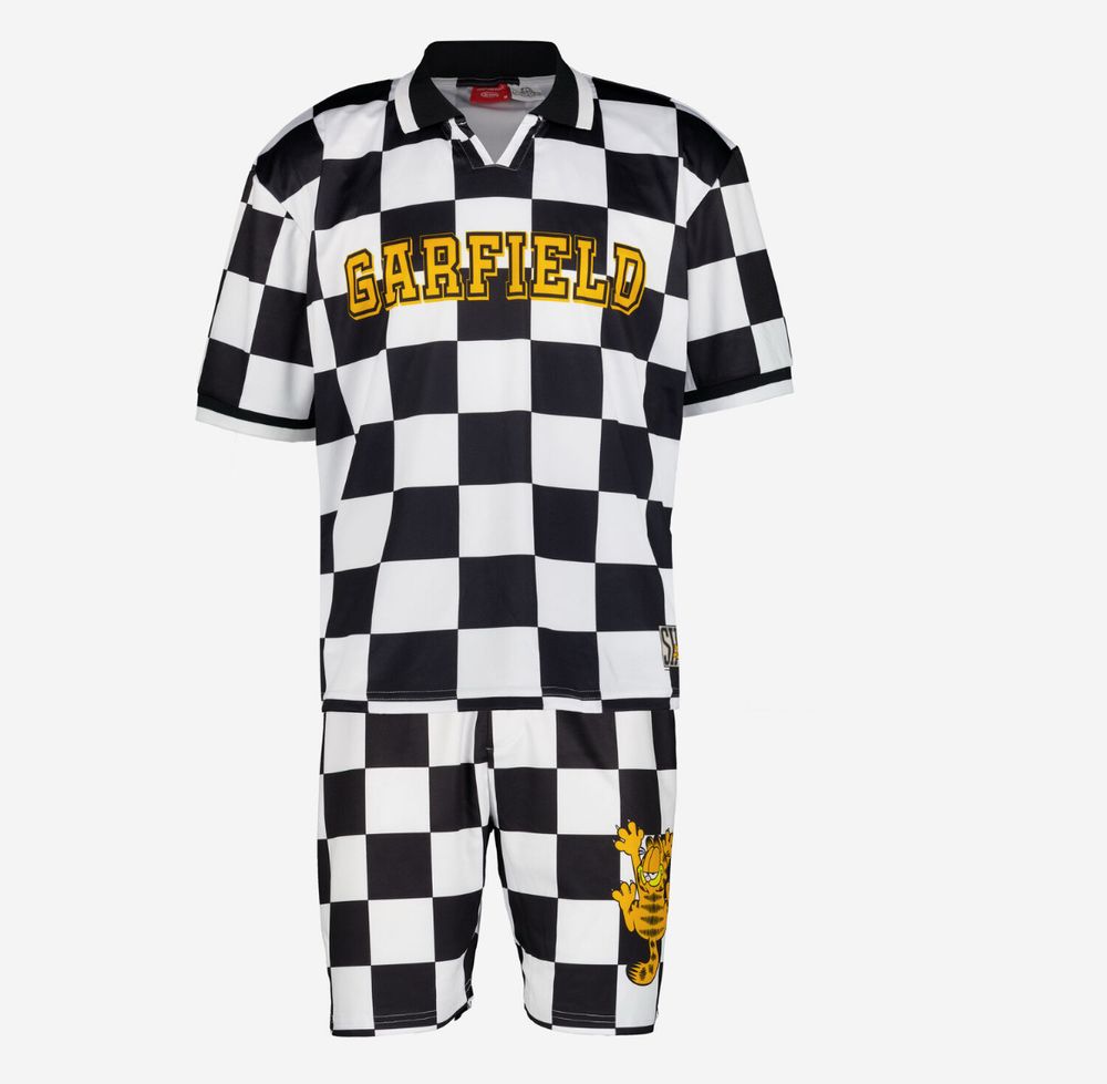 A catalogue image of a two piece checkered shirt/shorts that that has the text GARFIELD in caps and an image of Garfield hanging onto the shorts