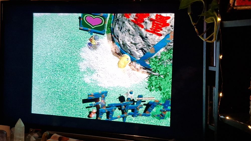 Patamon pushing a boulder in Digimon World 