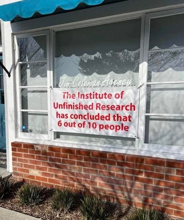 Banner displayed in front of a building reads, "The Institute of Unfinished Research has concluded that 6 out of 10 people." The setting features a brick wall and some plants