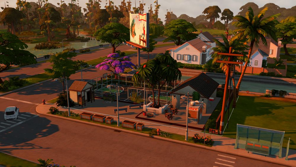 another angle of the basketball court and park. the park has a little pavillion