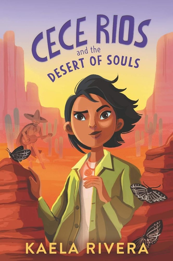 Image shows cover of the book Cece Rios and the Desert of Souls by Kaela Rivera

A Latine girl looks at the viewer from between two pillars of rock in a valley in the desert. Three black and white butterflies are on the pillars, and a skeletal being strums a guitar in the background. The image evokes power, compassion, perseverance, and life. 