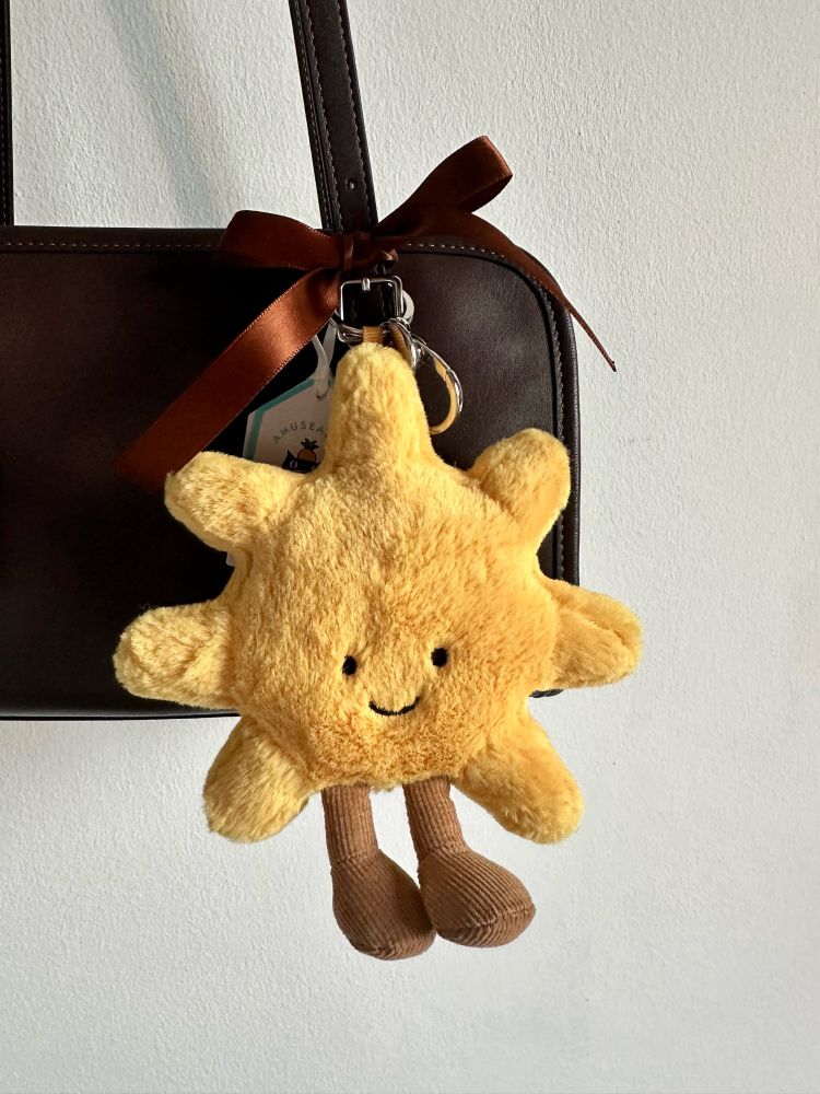 A keychain of a sun