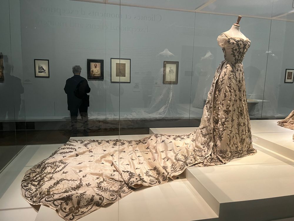 A white worth dress with long train