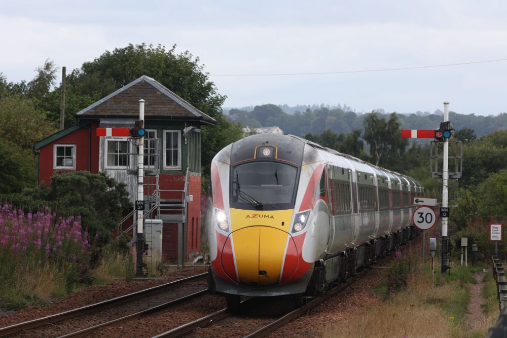 LNER Azuma 800101 passes the signal box and semaphores at Montrose as it approaches the station working 1E15 Aberdeen to London Kings Cross.