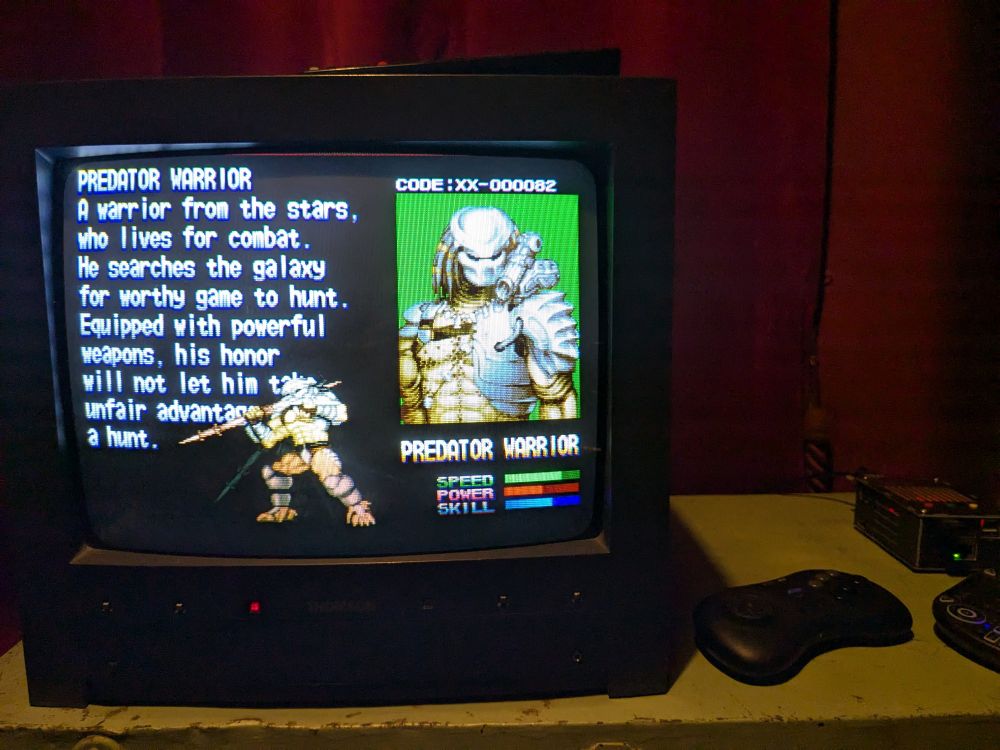 The arcade game Alien Versus Predator playing on a CRT TV