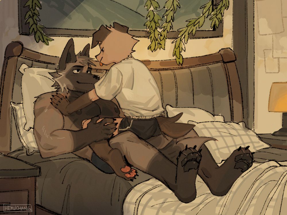 autumn holding hemu by his thighs on the bed being silly