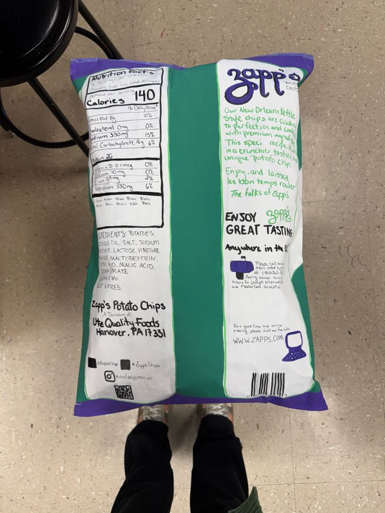 Front of large Zapp’s salt and vinegar potato chip bag sculpture. 