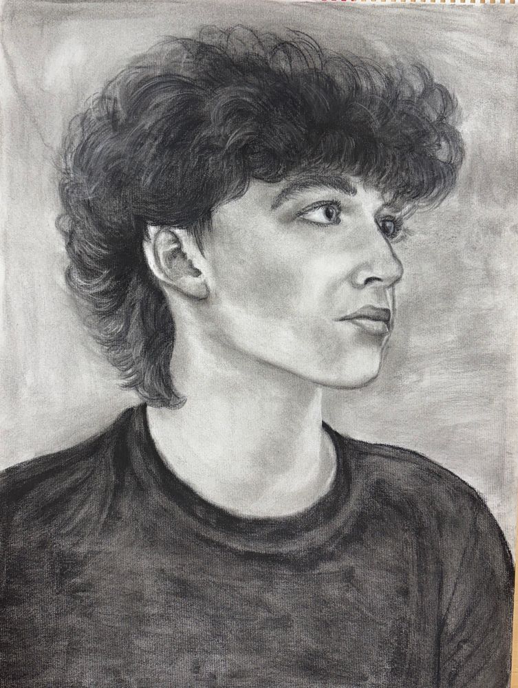 Charcoal drawing of a teenage boy in profile. 