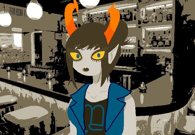 a blueblood troll is standing in front of a bar. her hair is tied in a bun. she has a blue top with a black top under it. 