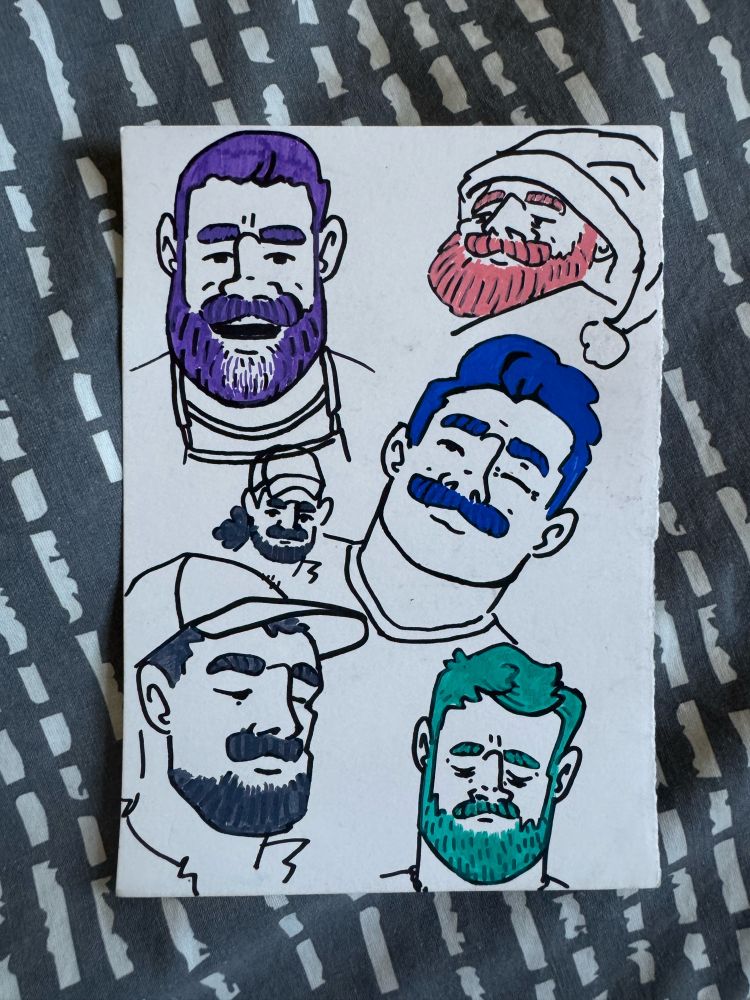 Sharpie and posca paint market portraits of moustachioed and fluffy faced men 