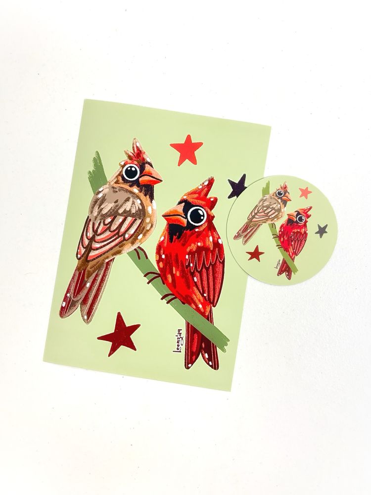 A print and sticker featuring a northern cardinal male and female