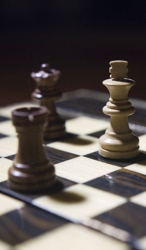 Close up of a chess game.
