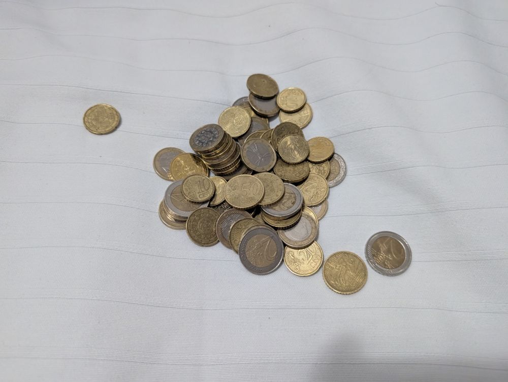 about €44 worth of coins.  And not even all full-euro denominations - there's a mix of 50c, 20c and even 10c coins in there
