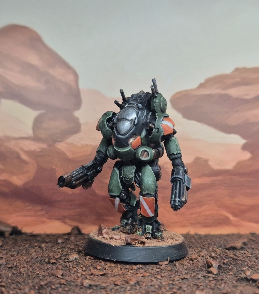Komodu Mech from Heresy Miniatures in olive green/orange livery