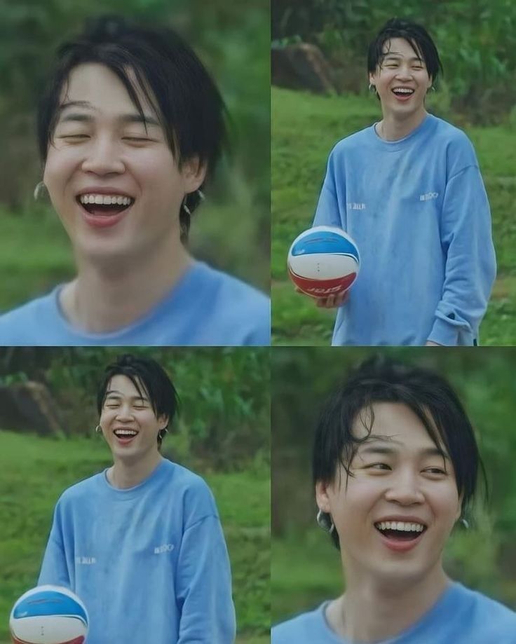 Jimin playing football in the rain.