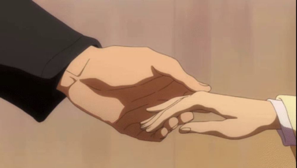 a man and a woman holding hands in a cartoon