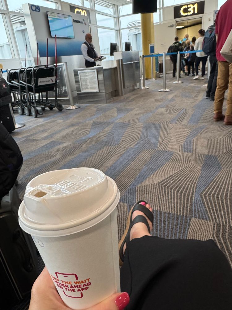 At airport with coffee