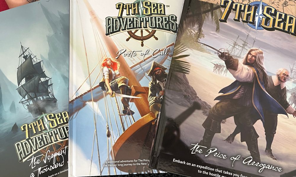 Libros del mecenazgo de Agathe “The Price of Courage”. Son dos libros en tapa dura y uno en tapa blanda, todos ellos con portadas piratescas