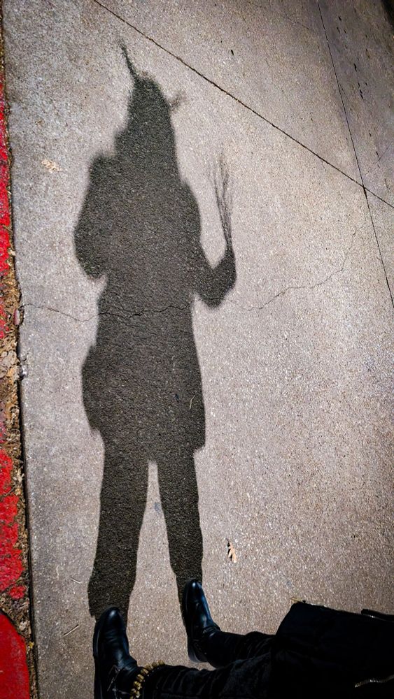 Op's shadow showing the outline of their Krampus costume 